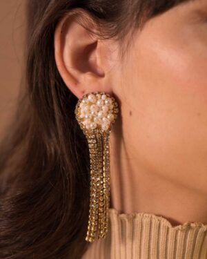 aretes largos con perla
